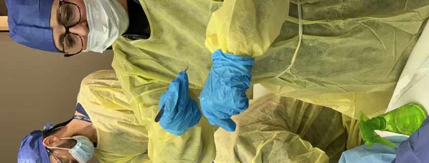 Dr Kelemen presenting a long hair graft